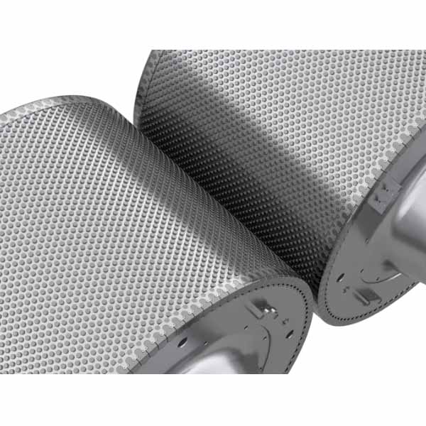 HPGR stud rollers and tyre segments with dense hexagonal stud matrix pattern - high pressure grinding roll hardfacing surface showing welded carbide stud array on cylindrical roller tires - ZHILI foundry