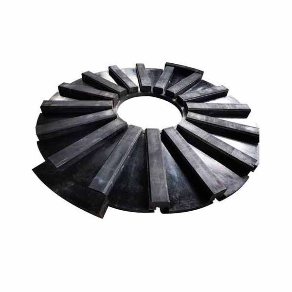 Rubber mill liner assembly in circular radial pattern - multiple curved lifter bars arranged around central discharge opening - wear resistant rubber or polyurethane lining system for ball mill inner surface protection - ZHILI foundry